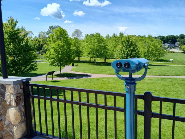 Overlooking the restored Paul Revere Heritage Site — the Revere Green with walking paths and landscaped grounds.